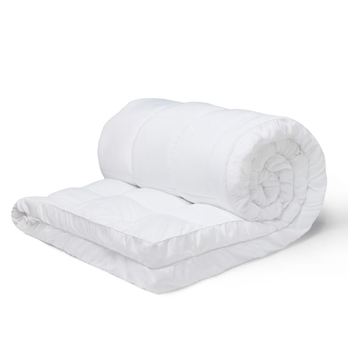 An image of a rolled up Silentnight Deep Sleep Ultimate 1000 Mattress Topper