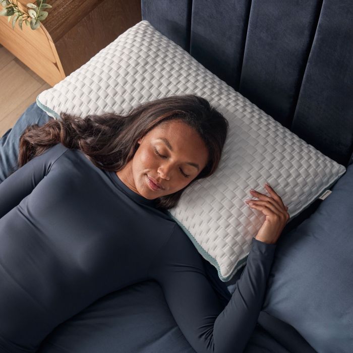 person on back lying down on ultragel pillow